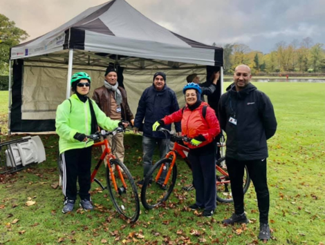 Community members cycling in the park